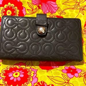 This and vintage Coach wallet with so many compartments.